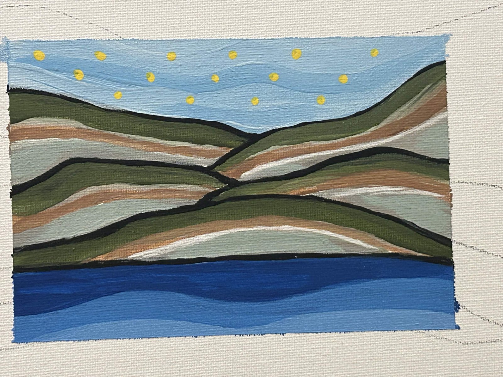 Painting of layered hills over a lake with yellow dots in the sky
