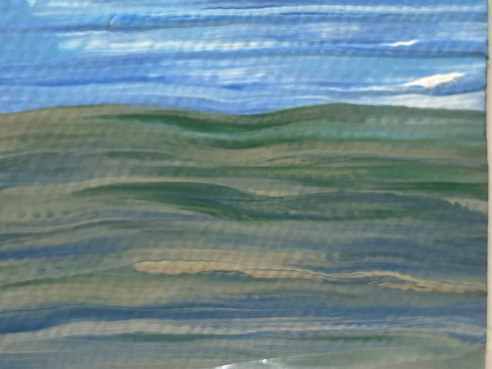 Horizontal-banded painting in blues and sage greens evoking a coastline