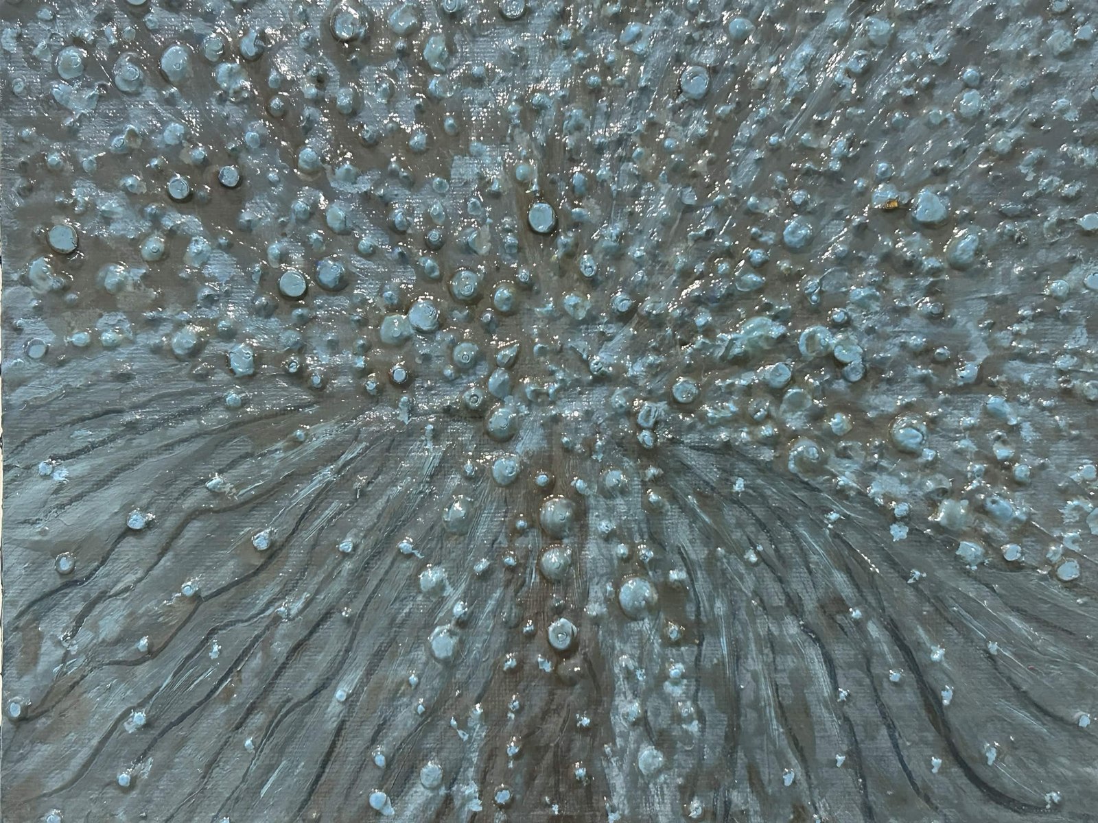 Heavily textured silver-grey painting with light blue droplet-like marks scattered across